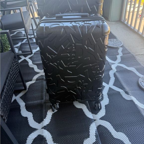 Sleek Black Embossed Suitcase